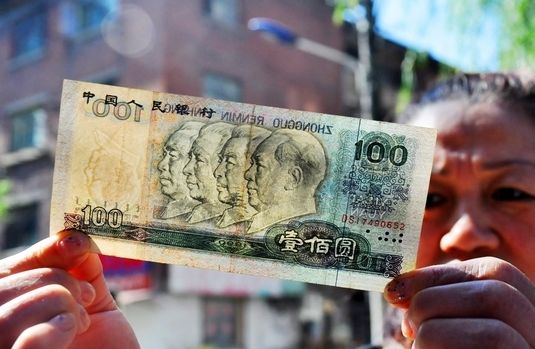 ͼΪ��100Ԫ������ڵ�ë��ϯˮ��ͷ��ӡ���ˡ�