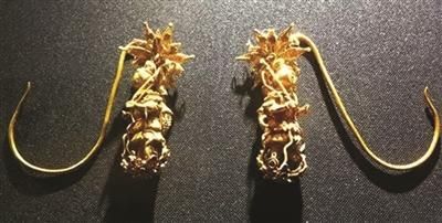 明代的纯金掐丝点焊耳坠,完全打开后高度近11厘米