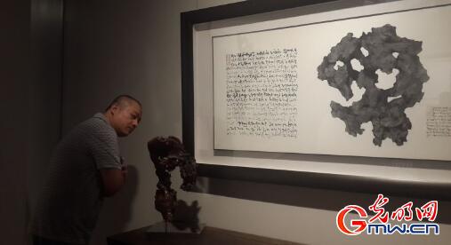 ��Ȩ�ȡ���ʯ�����뾳������������Ʒչ��Ļ